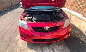 Toyota Corolla LE 4dr Sedan (1.8L 4cyl 4A) 2010 Red
