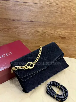 Gucci Medium Embossed Chain Shoulder Bag