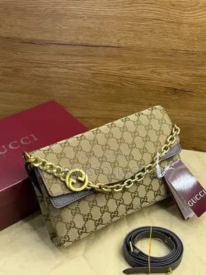 Gucci Medium Embossed Chain Shoulder Bag