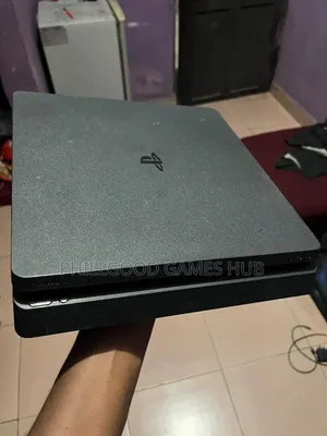 PS4 Slim With 6 Games and I Pad.