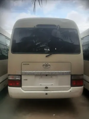 Toyota Coaster 2023 Brown