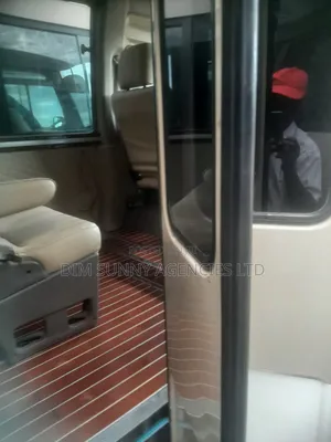 Toyota Coaster 2023 Brown