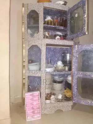 Show Glass With Glass Cups and Plate. Waste Water Hose