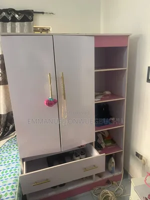 Wardrobe, Mattress and Fan