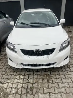 Toyota Corolla Base 4dr Sedan (1.8L 4cyl 5M) 2010 Off white