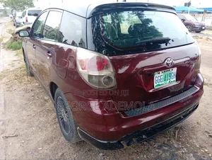 Toyota Matrix Hatchback AWD (1.8L 4cyl 4A) 2006 Red