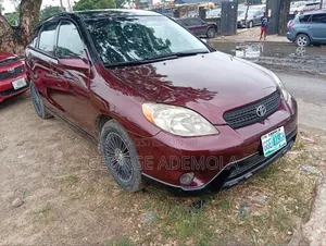 Toyota Matrix Hatchback AWD (1.8L 4cyl 4A) 2006 Red