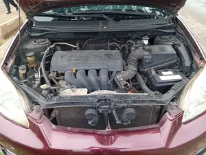 Toyota Matrix Hatchback AWD (1.8L 4cyl 4A) 2006 Red