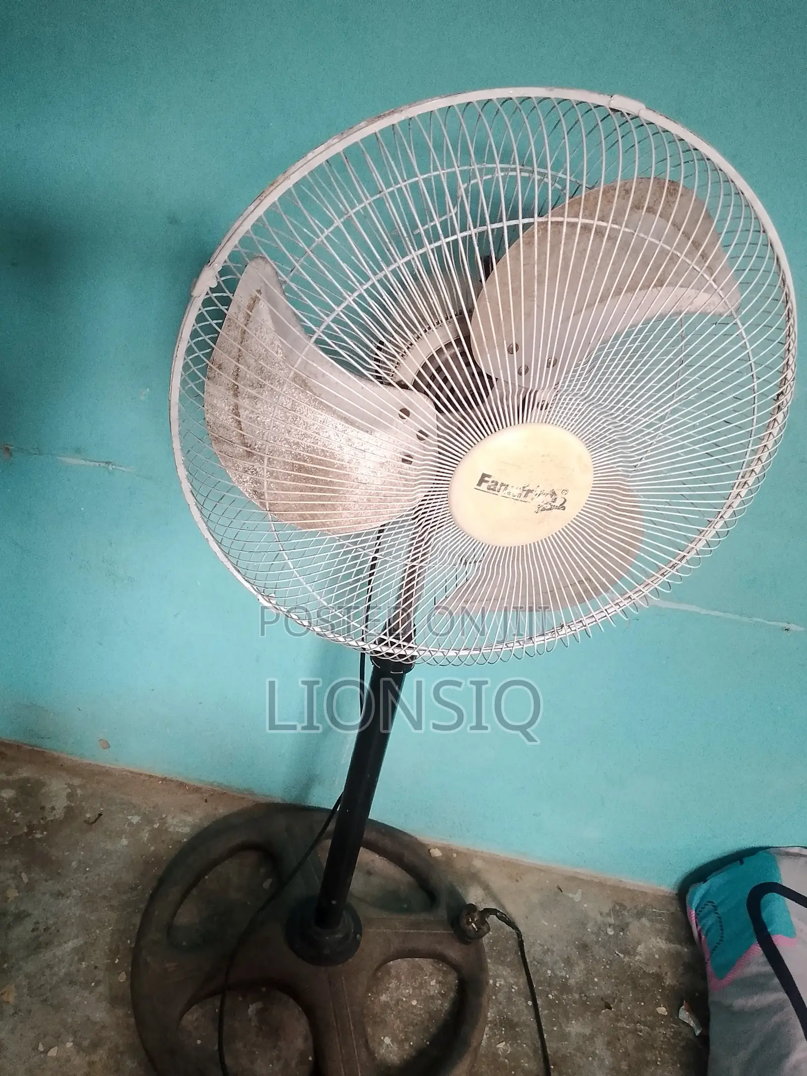 Used Working White Electric Standing Fan