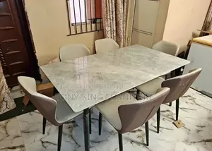 Modern 6-Seater Dining Set Featuring a Grey Marble Top With Metal Leg