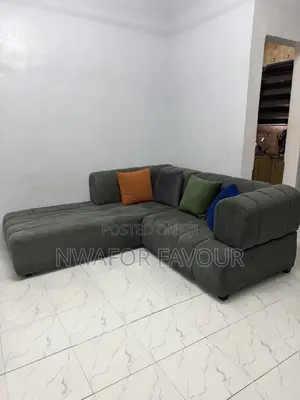 Barely Used L-Shaped Couch With 4 Throw Pillows