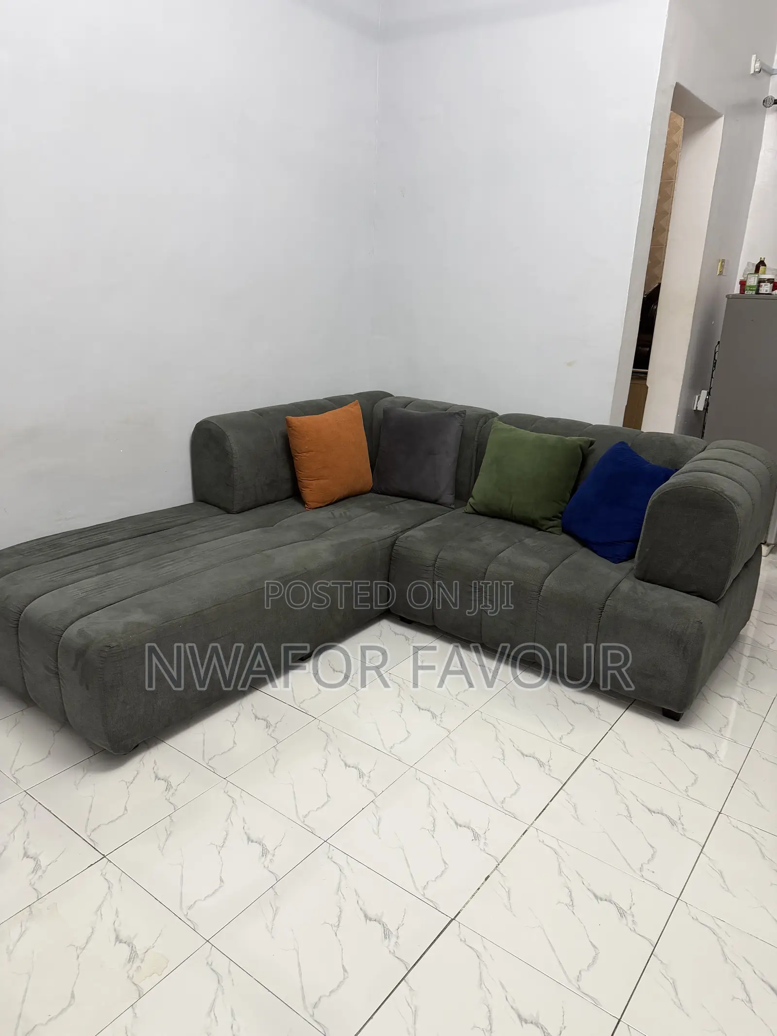Barely Used L-Shaped Couch With 4 Throw Pillows