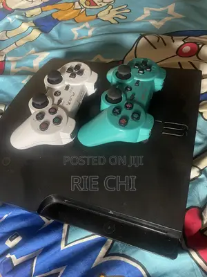 PS3 SLIM for Sell With 2 Pads and 5 Games