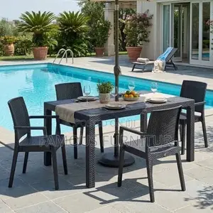 The Image Shows a Black Resin Rattan-Style Outdoor Dining Set