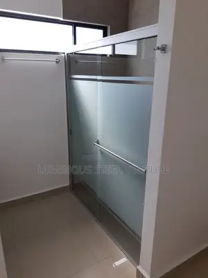 Spacious Look: Clear Glass Panels Let Light Flow Freely, Making Small