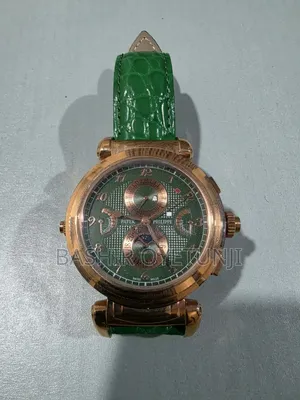 Patek Philippe Wrist Watch With Green Leather