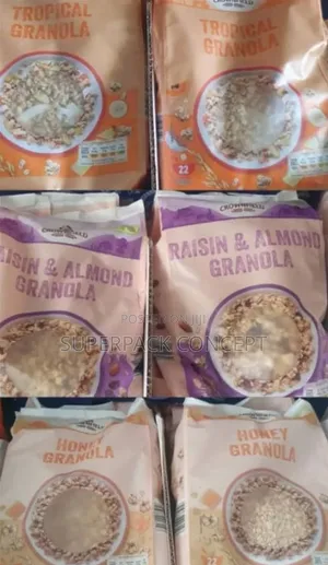 A Carton of CROWNFIELD Tropical/Raisins Almond Granola by 10