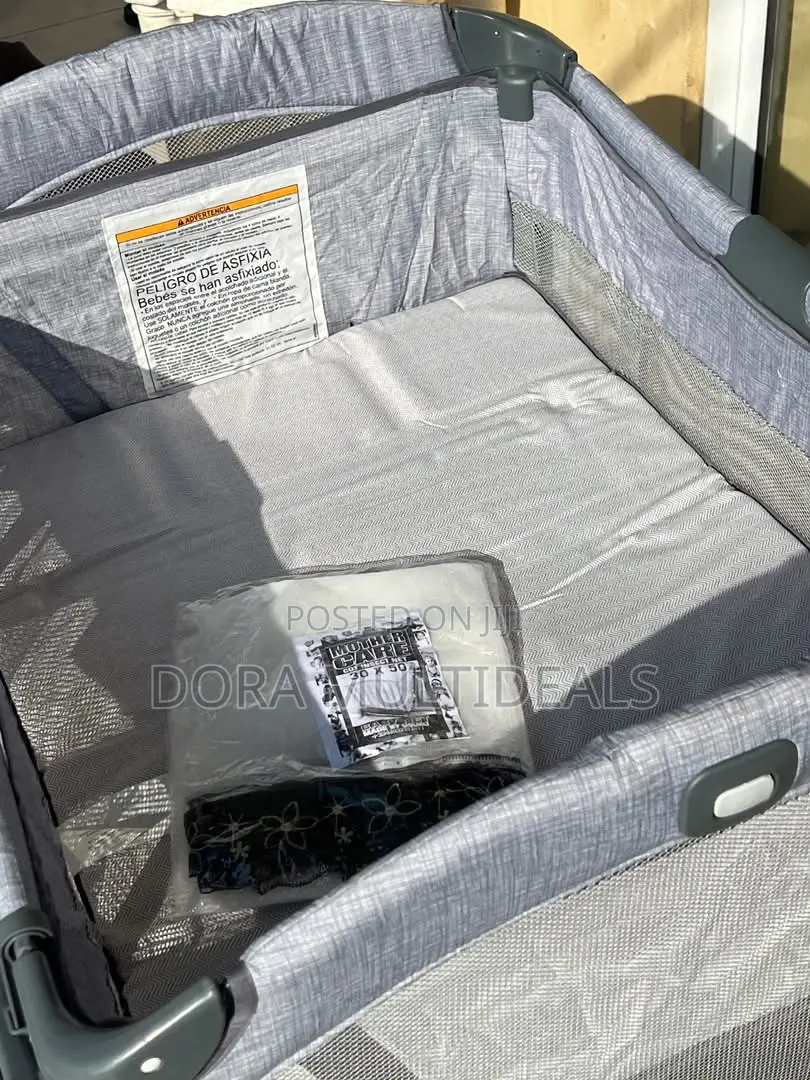 Graco Imported Cot With Storage Space and Mosquito Net