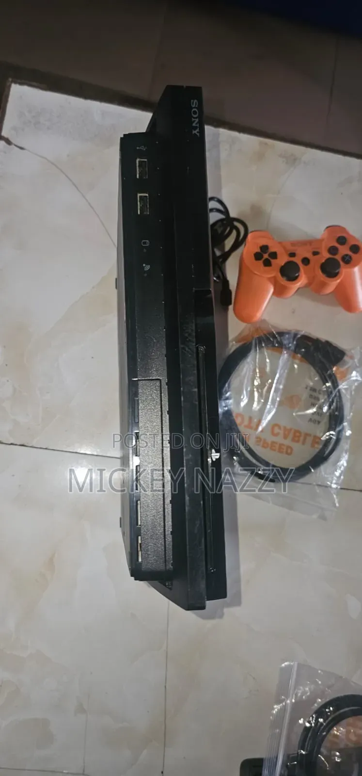 Playstation 3 Slim, With Pad and 5 Games.