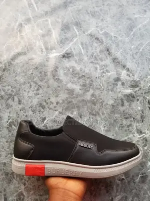 Luxury Burberry Men’s Leather Slip-on Sneakers – Black and Brown