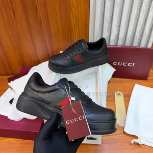 Luxury Update Gucci Men's Chunky Trainers in Black Leather.