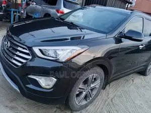 Hyundai Santa Fe Limited w/Saddle Interior 4dr SUV AWD (3.3L 6cyl 6A)