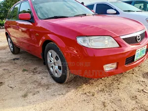 Mazda 323 2000 Red