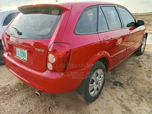 Mazda 323 2000 Red