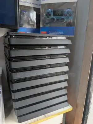 Direct Uk Used PS4 Slim With 2 Pad and Games Inside