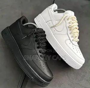 Original Nike Air Force 1 Sneakers. Available in Black and White