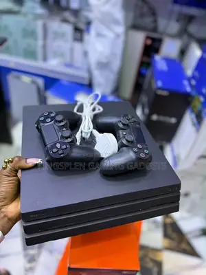 Available as Seen PS4 Pro With 2 Controllers and 15 Games Inside