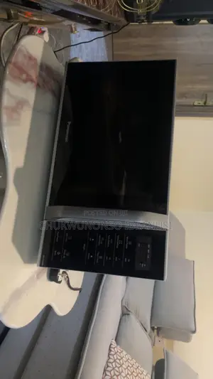 Panasonic Microwave (Model NN-ST34HM, 25L).