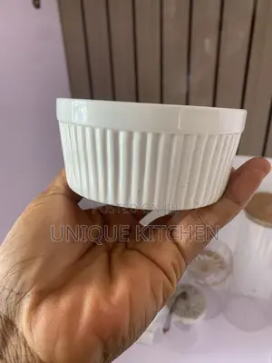 White Porcelain Ramekin With a Fluted, Ribbed Exterior.