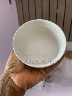 White Porcelain Ramekin With a Fluted, Ribbed Exterior.