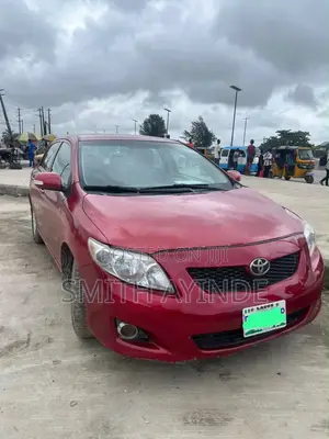 Toyota Corolla 1.8 Exclusive Automatic 2009 Red