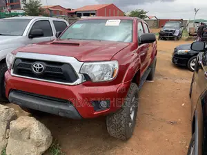 Toyota Tacoma V6 4dr Double Cab 4WD 6.1 ft. SB (4.0L 6cyl 5A) 2015 Red