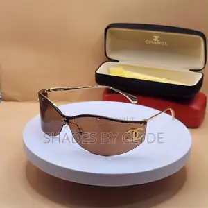 Luxury Chanel Gold-Trimmed Shield Sunglasses – Statement Piece