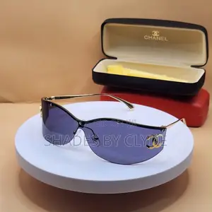 Luxury Chanel Gold-Trimmed Shield Sunglasses – Statement Piece