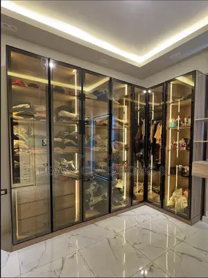 Beautiful Closet With Frame Glass Doors