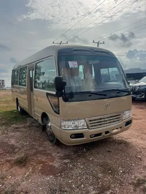 Toyota Coaster 2015 Gold