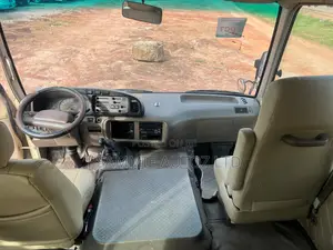 Toyota Coaster 2015 Gold