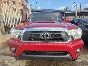 Toyota Tacoma V6 4dr Double Cab 4WD 6.1 ft. SB (4.0L 6cyl 5A) 2014 Red