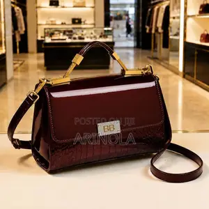 A Deep Glossy Burgundy and Glossy Black Bag