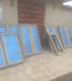 Neat Grey Aluminum Casement Windows With Blue Glass Installer Lagos