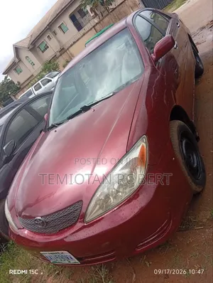 Toyota Camry LE 4dr Sedan (2.4L 4cyl 5M) 2004 Red