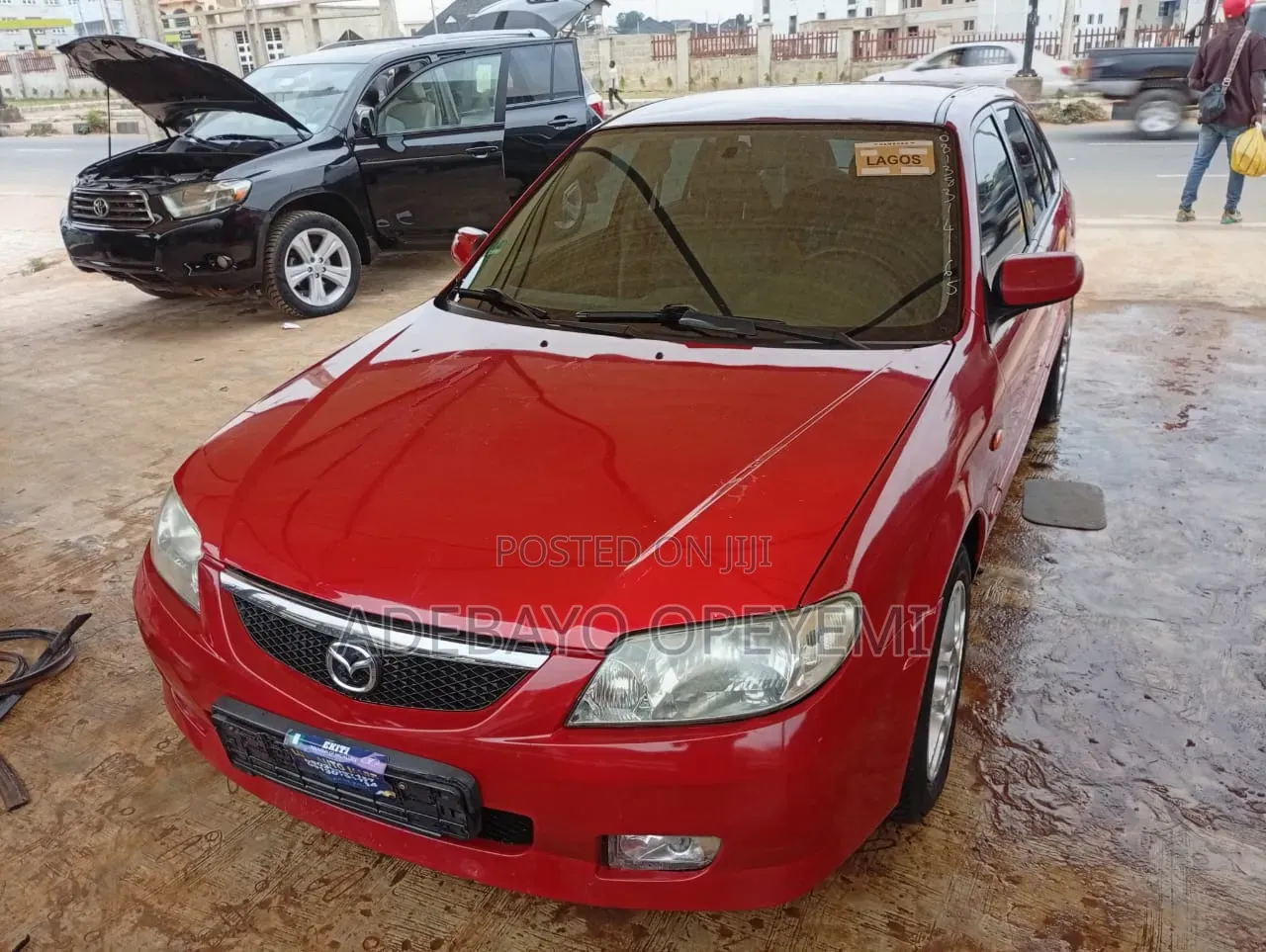 Mazda 323 2004 Red