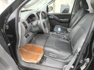 Nissan Frontier King Cab LE 4x4 2010 Black