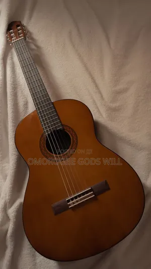 Barely Used Yamaha 38 Brown Acoustic Box Guitar With Bag. No Scratch