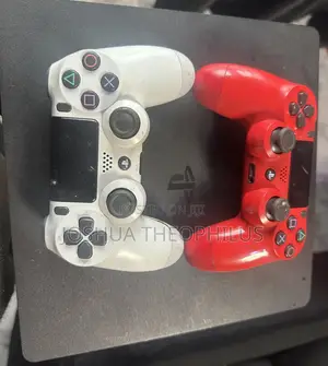 Uk Slim PlayStation 4 With Two Follow Come Pads and 10 Installed Games