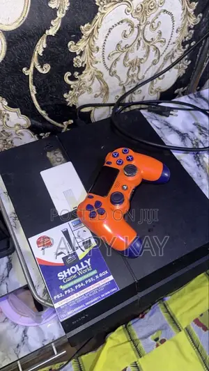 Clean and Working Perfectly Ps4 With 10 Games and One Pad for Sale